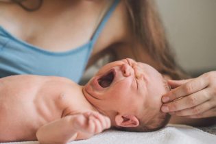 baby-crying-breastfeeding