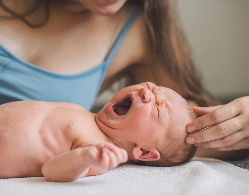 baby-crying-breastfeeding