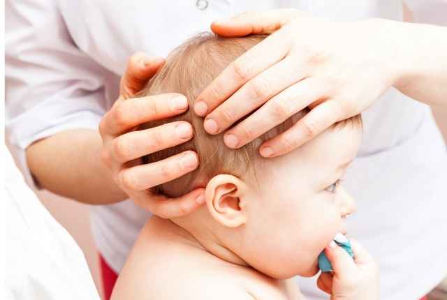 massage coconut oil into baby hair